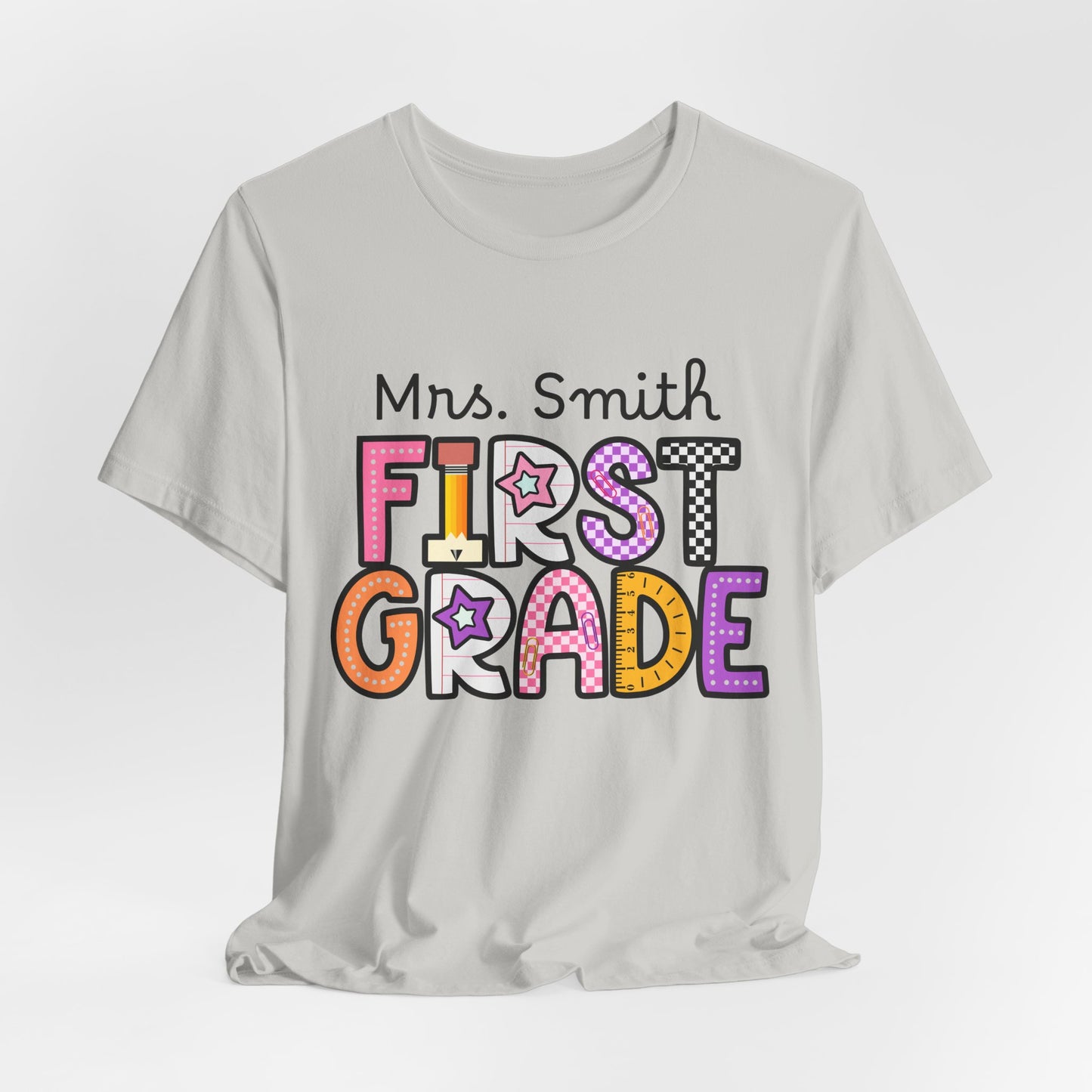 Personalized Colorful First Grade Teacher Graphic Tee