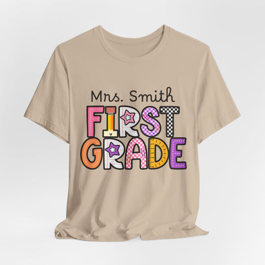 Personalized Colorful First Grade Teacher Graphic Tee