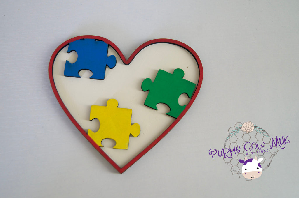 Puzzle Pieces Heart Icon